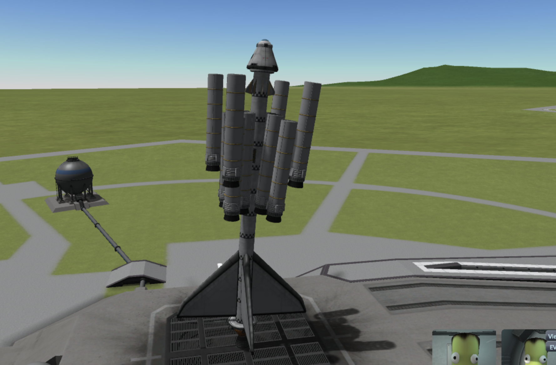 Kerbal Space Program screen grab - a ridiculous rocket overloaded with solid fuel boosters that wobbles around, crashes spectacularly, and gets all flamey