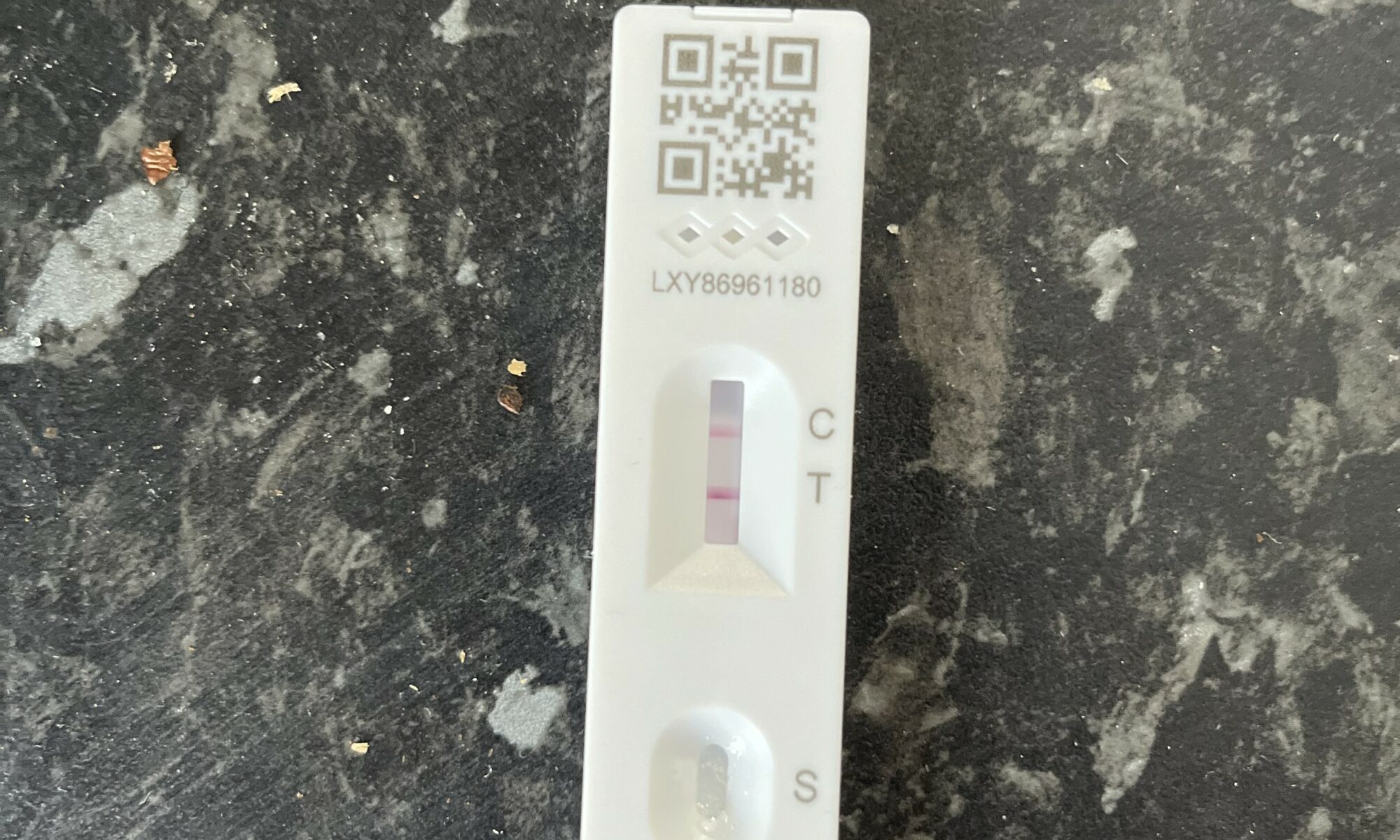 A Covid test showing positive result