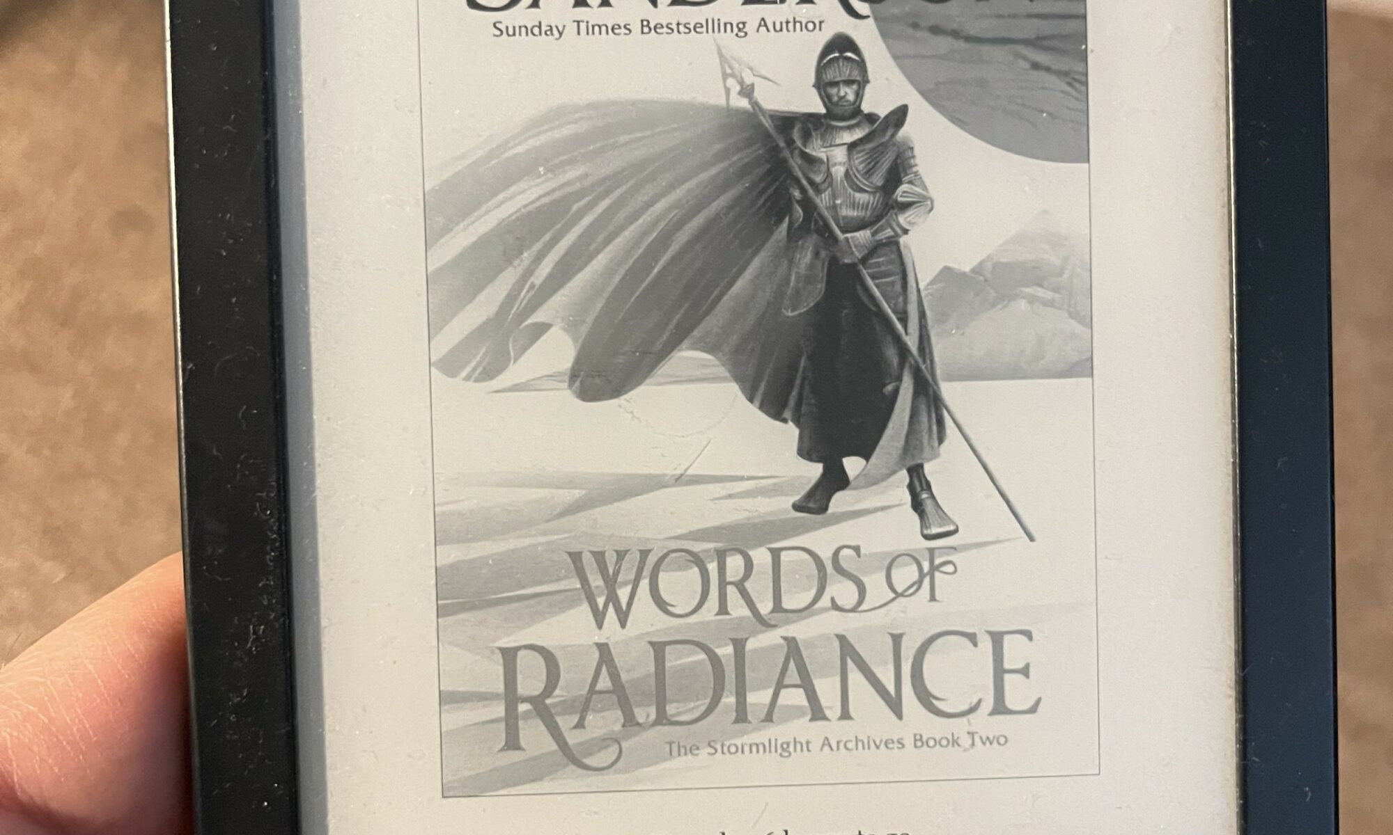 A photo of my Kobo eReader showing that I have started reading Brandon Sanderson’s Words of Raidiance. It’s show 1% read and 36 hours to go.